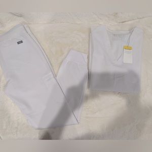 Figs scrub top and bottoms! Brand new with tags! Never worn!